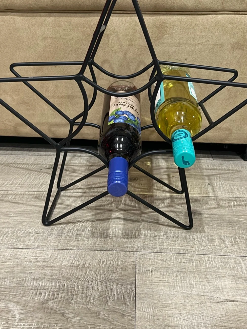Black Star-Shaped Metal Wine Rack - Holds Bottles Horizontally